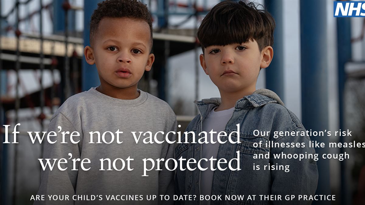 two boys standing with each other. Text reads: if were not vaccinated were not protected.